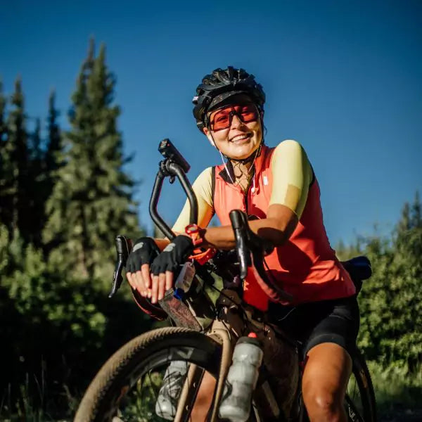 Ashley Carelock on her bike in the forest