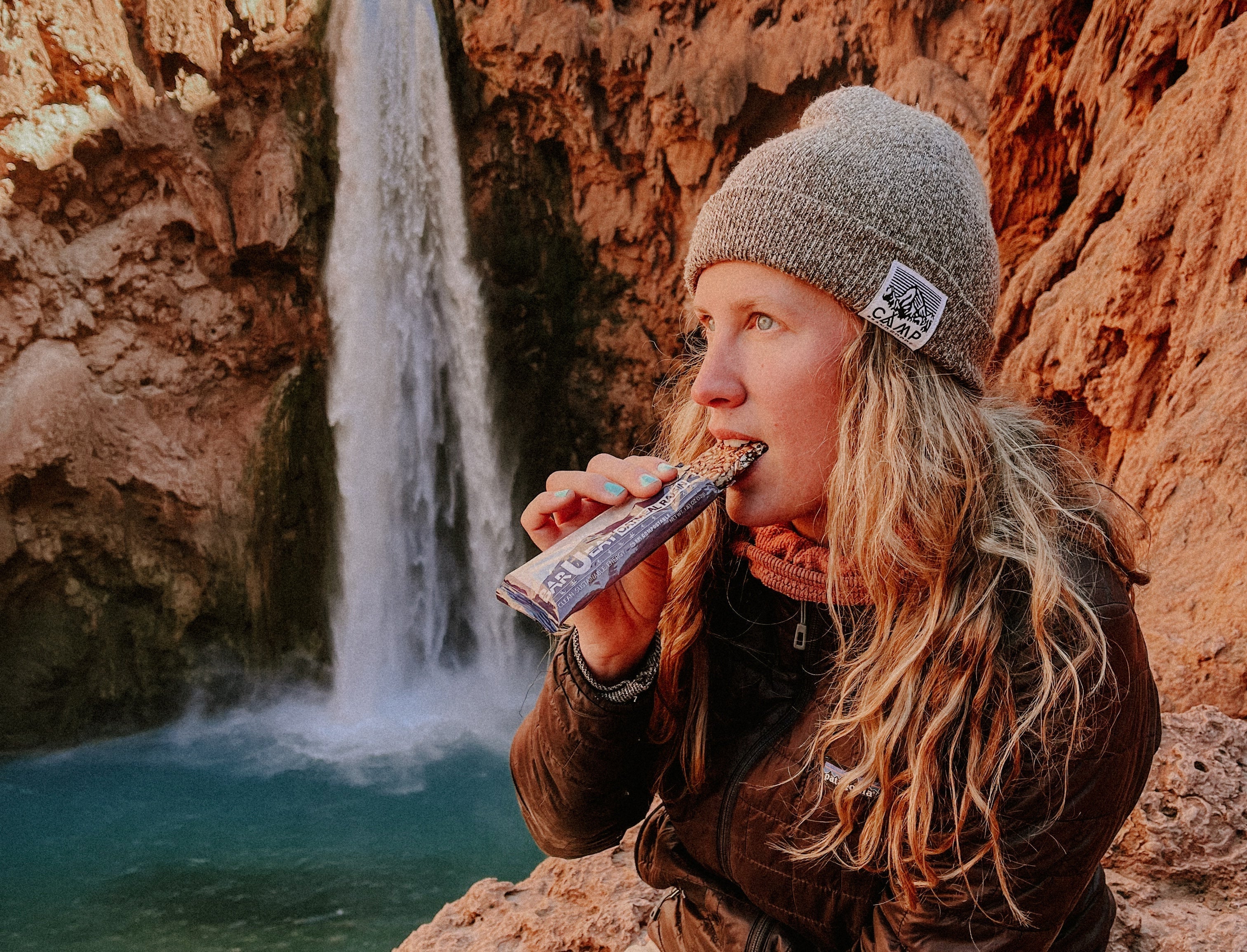 woman eating bar u eat for longevity