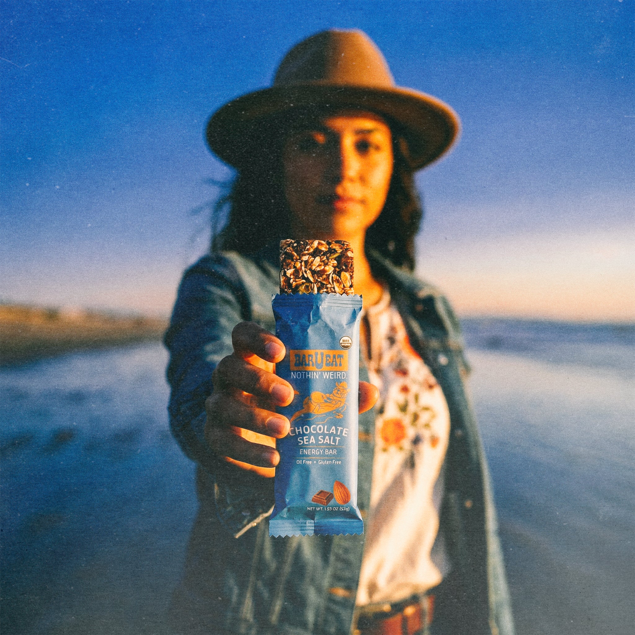 bar u eat chocolate sea salt bar woman holding bar