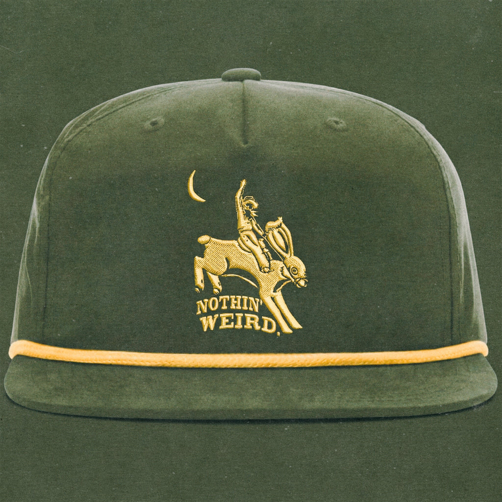 green and gold hat with a cowboy riding a bunny rabbit