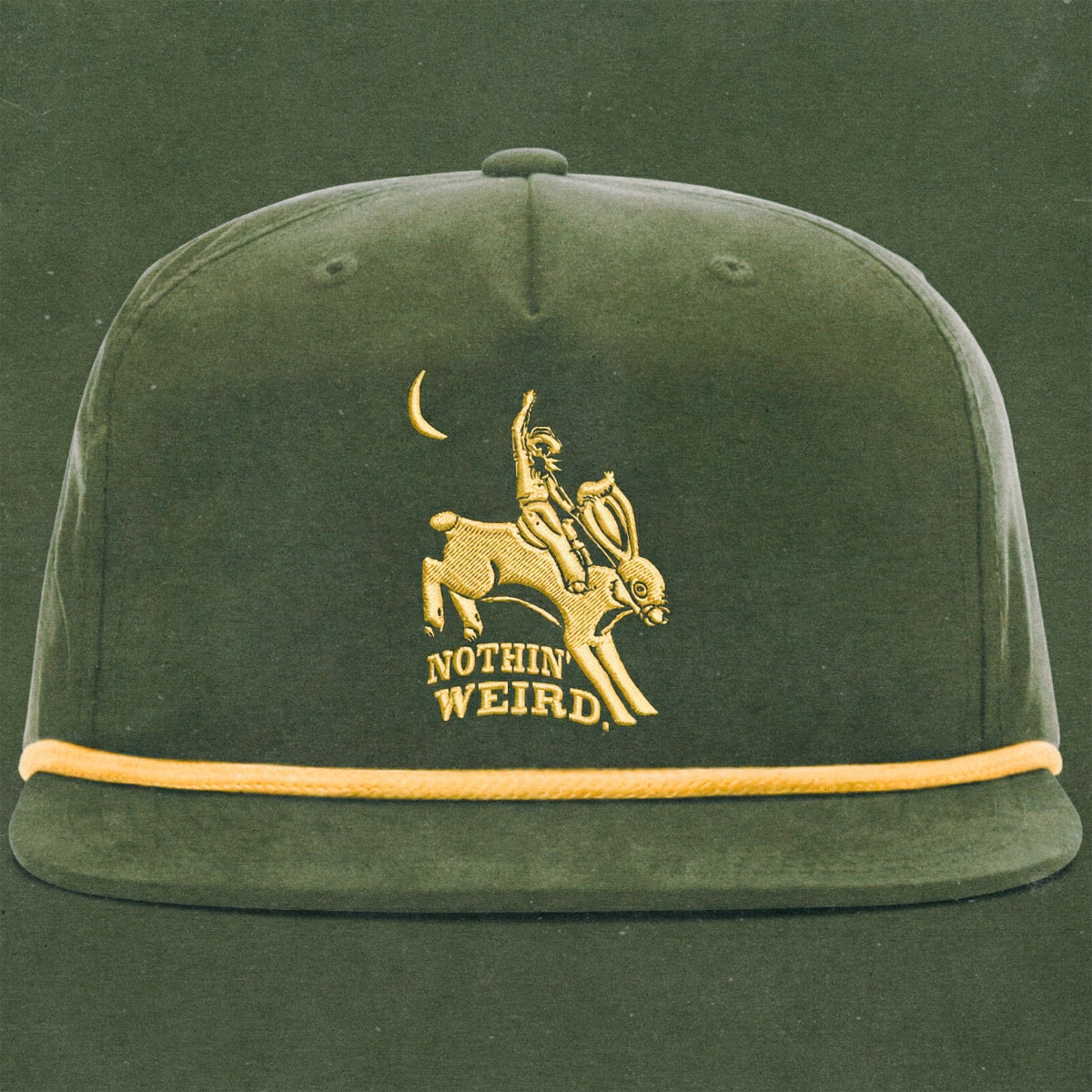 green and gold hat with a cowboy riding a bunny rabbit