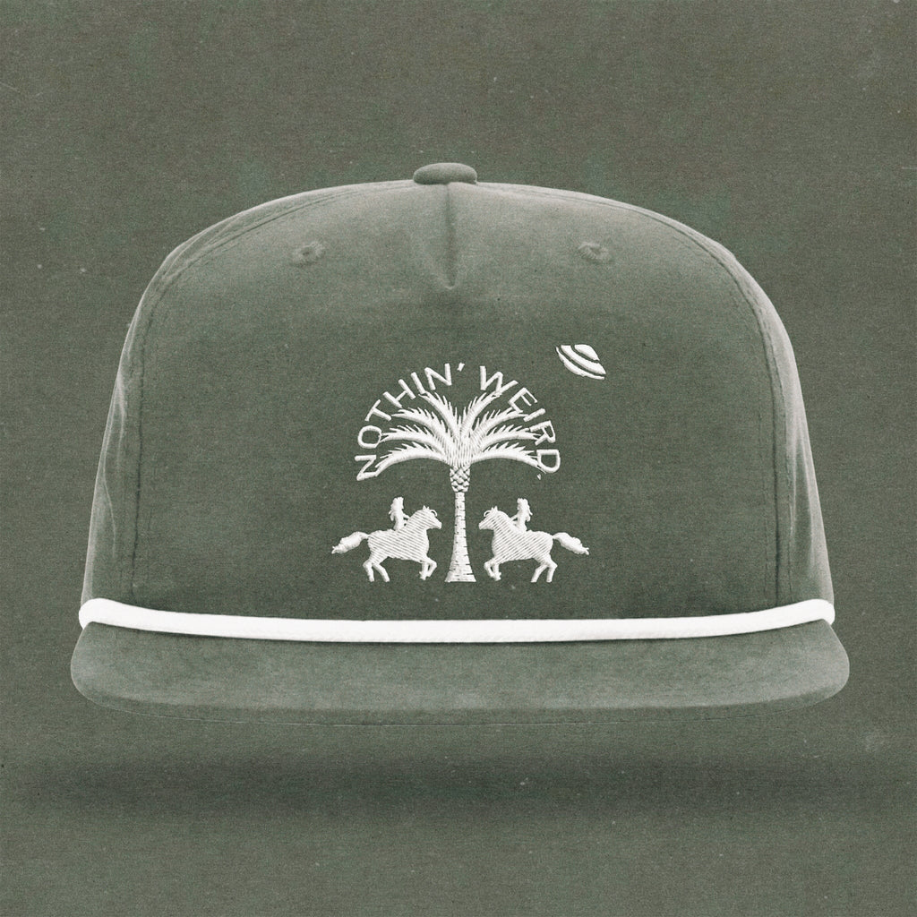 Grey and white ball cap with western horses, palm tree, and ufo stitched on it.