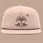Mauve ball cap with western horses, palm tree, and ufo stitched on it.