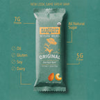 Barqéat energy bar packaging on a teal background with nutritional information.