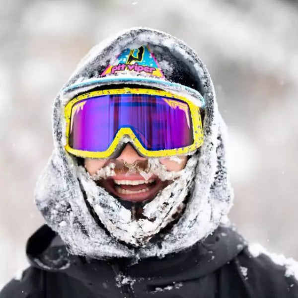 Hayden Price in ski goggles covered in snow